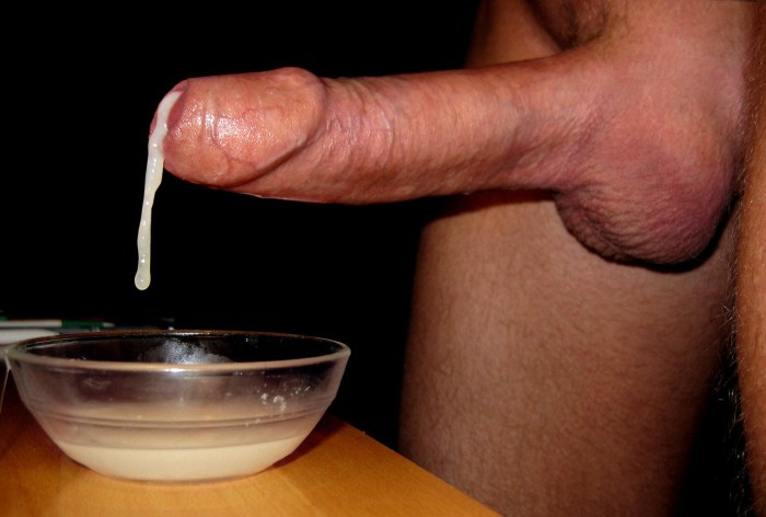 The man cums in a glass