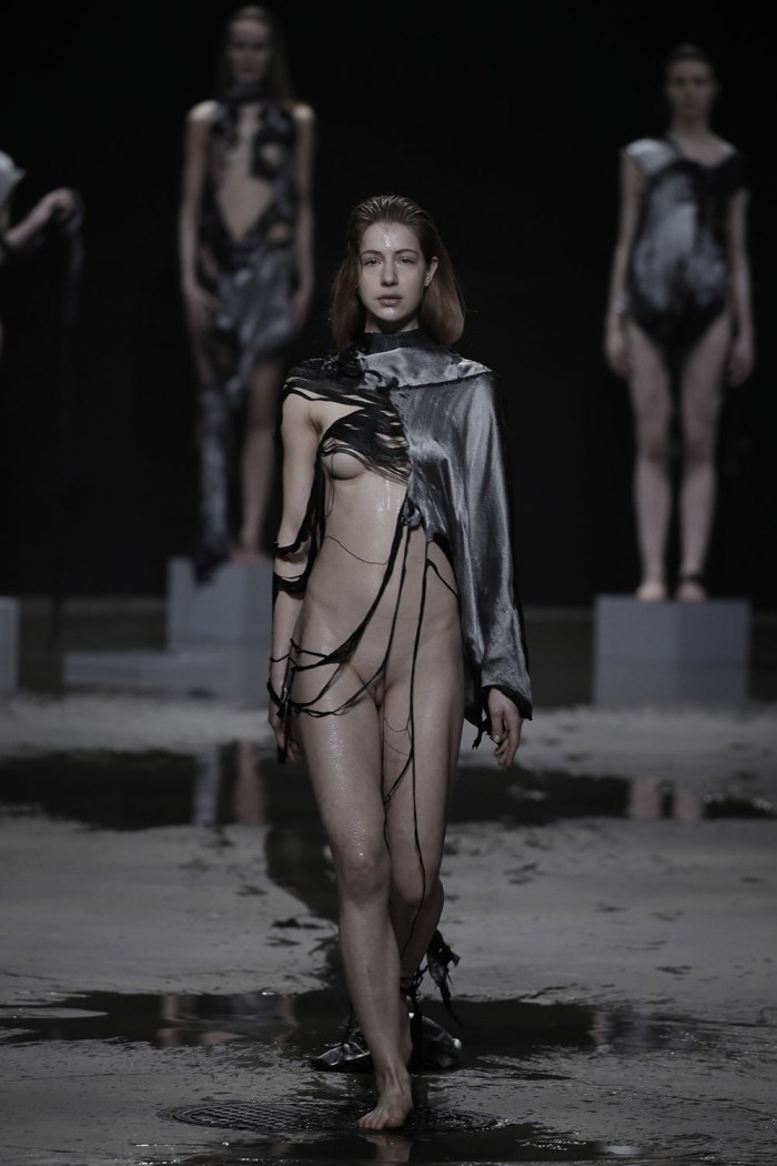 Naked fashion model on the catwalk