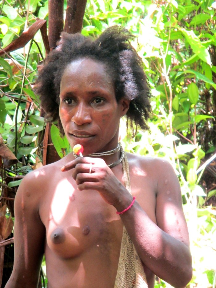Naked men and women of wild tribes