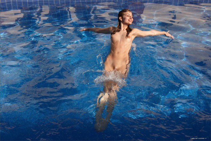 Beautiful girls lesbian in the lake