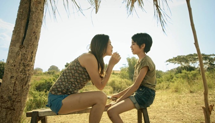 Boy and adult girl