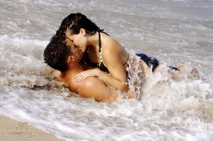 In love couples on the beach