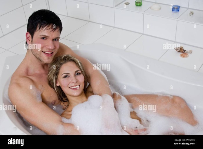Woman with a boy in the bathroom
