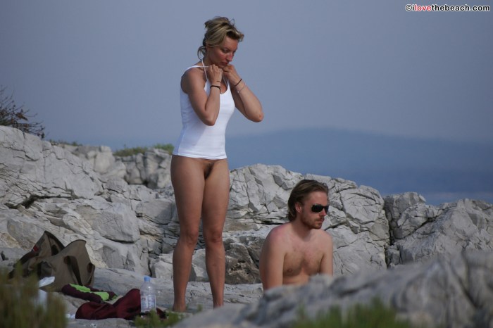Girls without a bottom on the beach Private