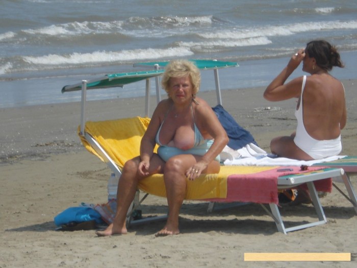 Old grandmothers on the beach spied