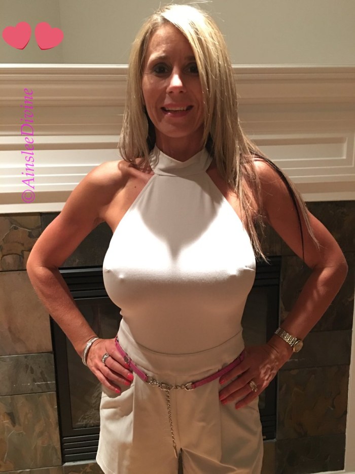 Mature in the dress topless