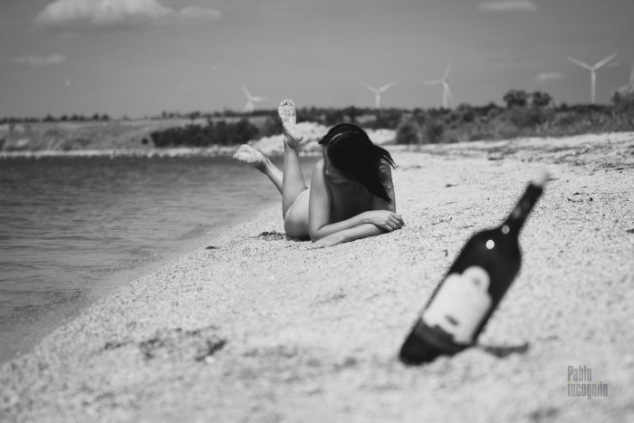 Miranda Kerr in a swimsuit lies