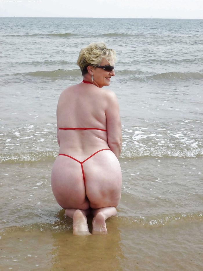Elderly women in microbikini