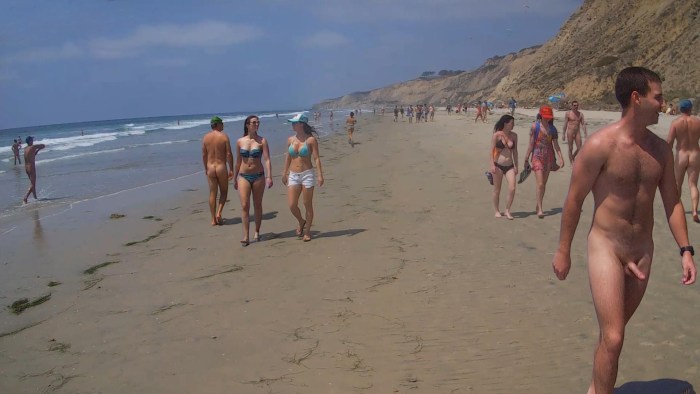 Naked men on a public beach