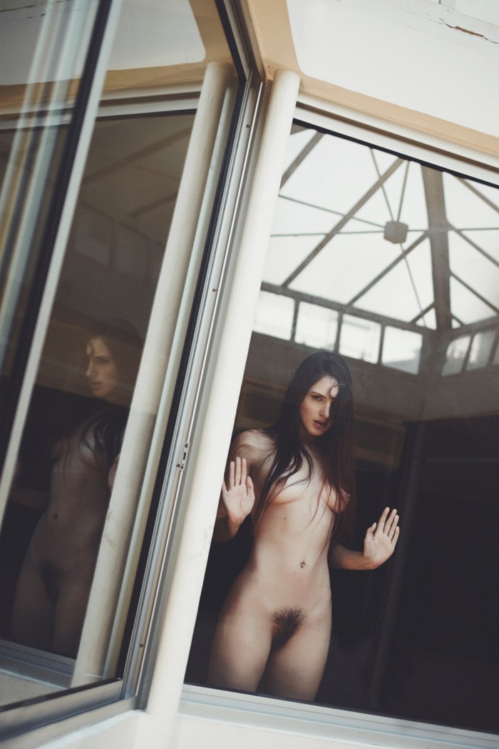 Naked on the balcony spied
