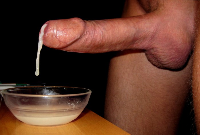 The man cums in a glass