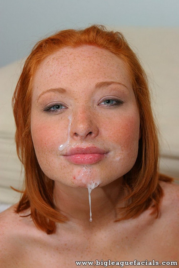 Girl with freckles sucks