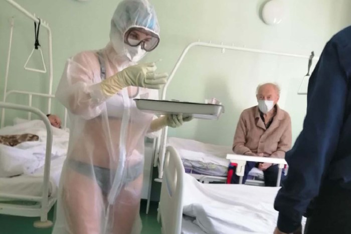 Tula nurse in a transparent protective suit
