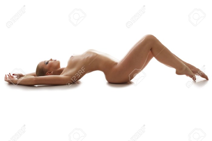 Naked woman lies on the floor