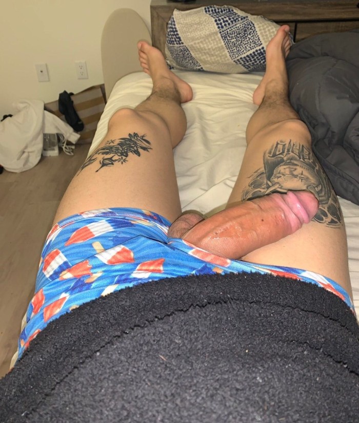 A huge member in shorts
