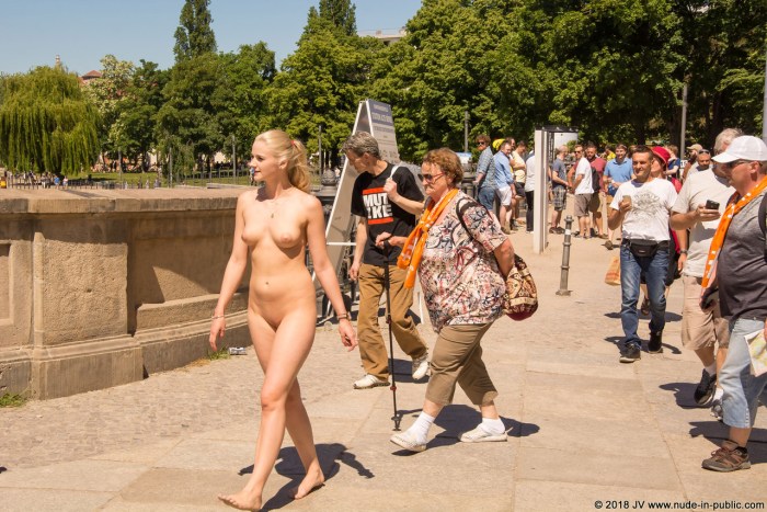 Naked chicks in a crowded place