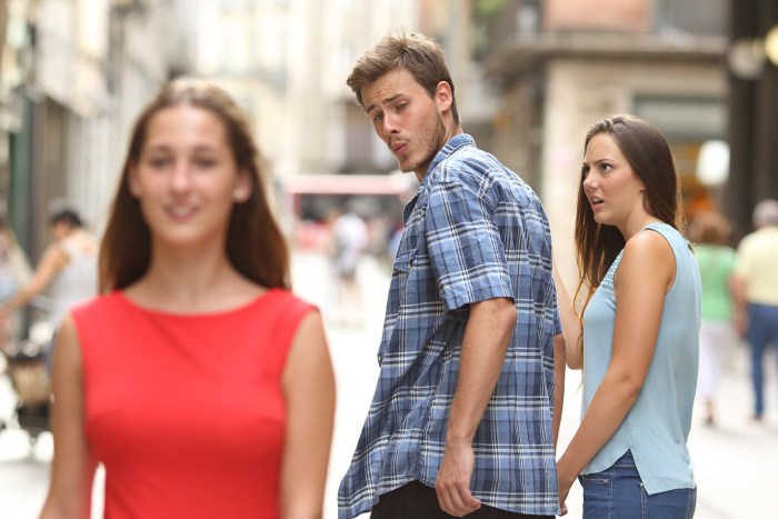 Meme with a guy and two girls