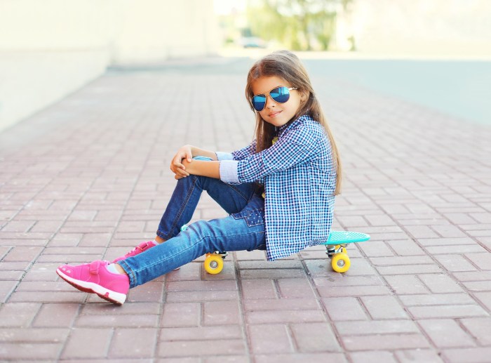 Girl and boy play opposite each other photo