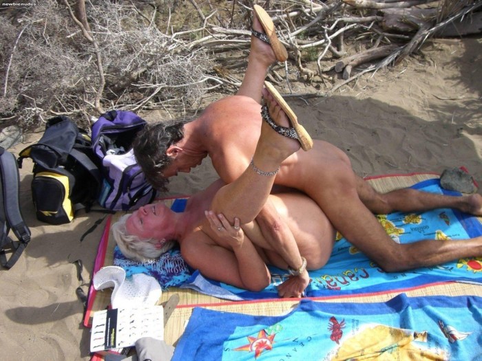 Old people fuck on the beach