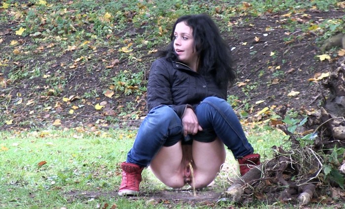 Girl pooping in the park