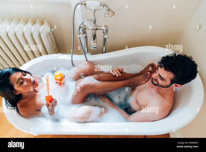 Couples together in the bath