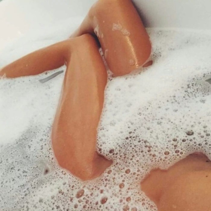 Feet in the bathroom with foam