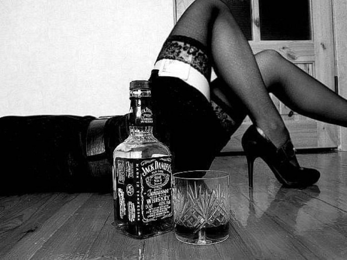 Girl with a bottle of cognac