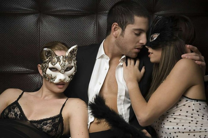 Man and two women