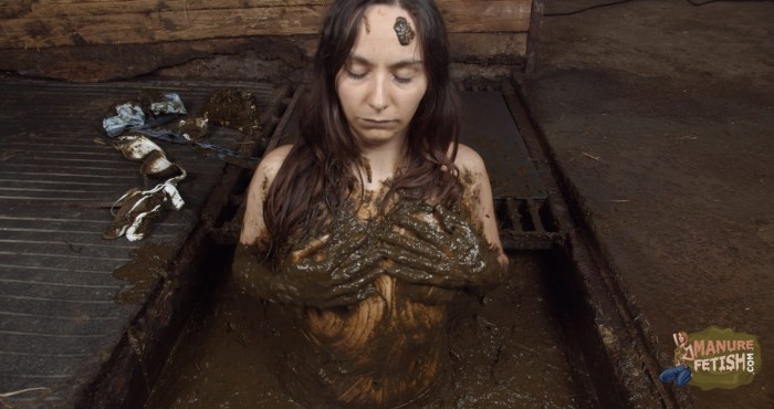 Girl naked in manure