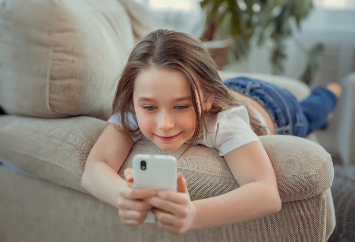 A child with a smartphone