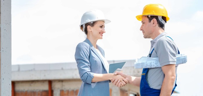 Builders squeeze their hands