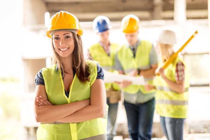 Girl in the helmet of the builder