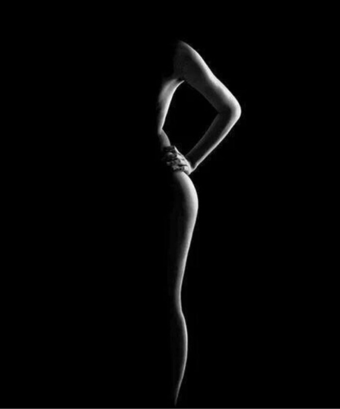 Female body in the twilight