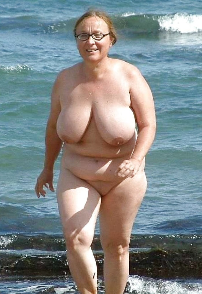 Naked mature fat people on the beach
