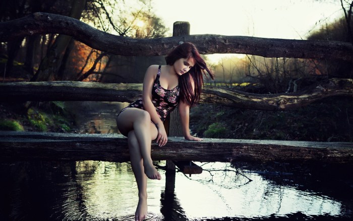 Girl on the bridge by the water