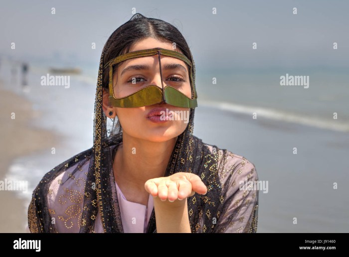 Iranian women on the face of a mask