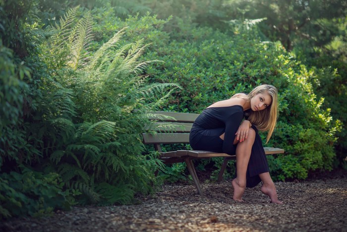 Tina Karol in the park on a bench
