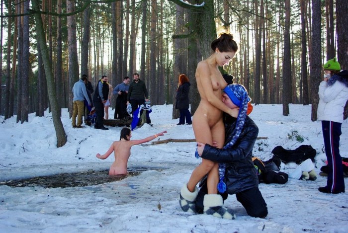 Naked women in the winter on the street