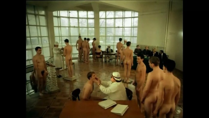 Naked guys on a medical examination at the military registration and enlistment office