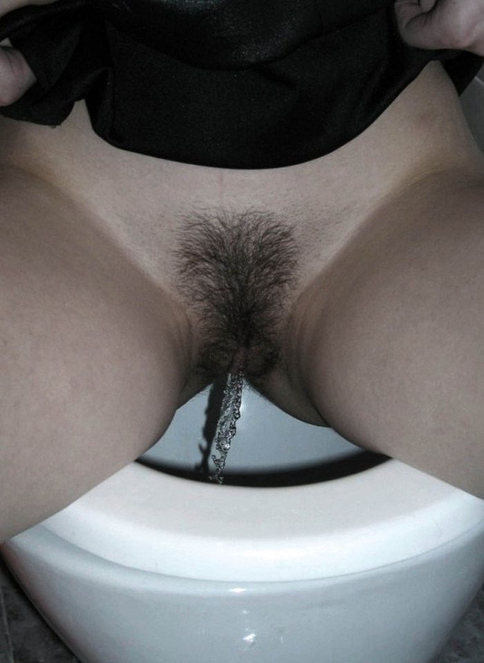 Naked women in a women's toilet