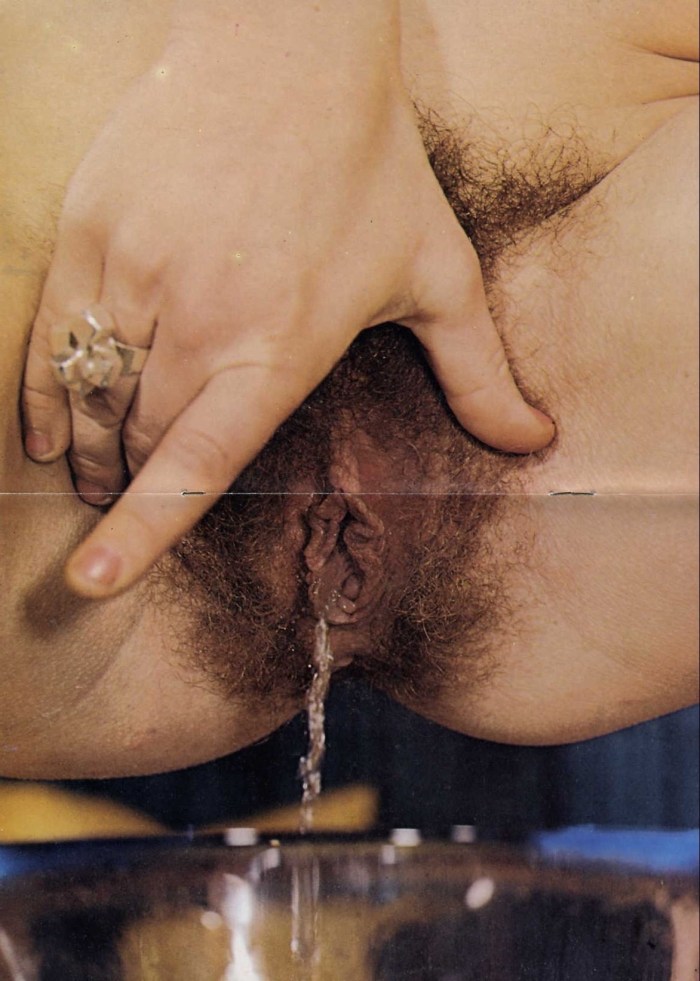 Hairy woman pissing