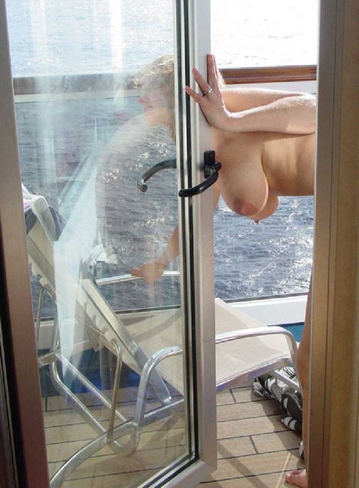Naked on the balcony spied