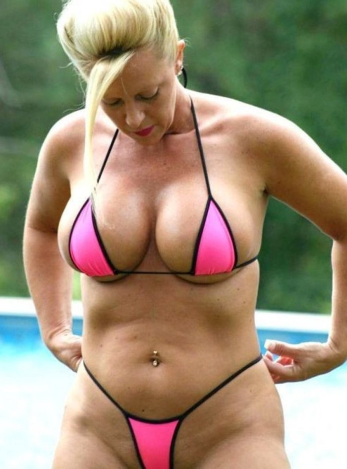 Elderly women in micro bikini