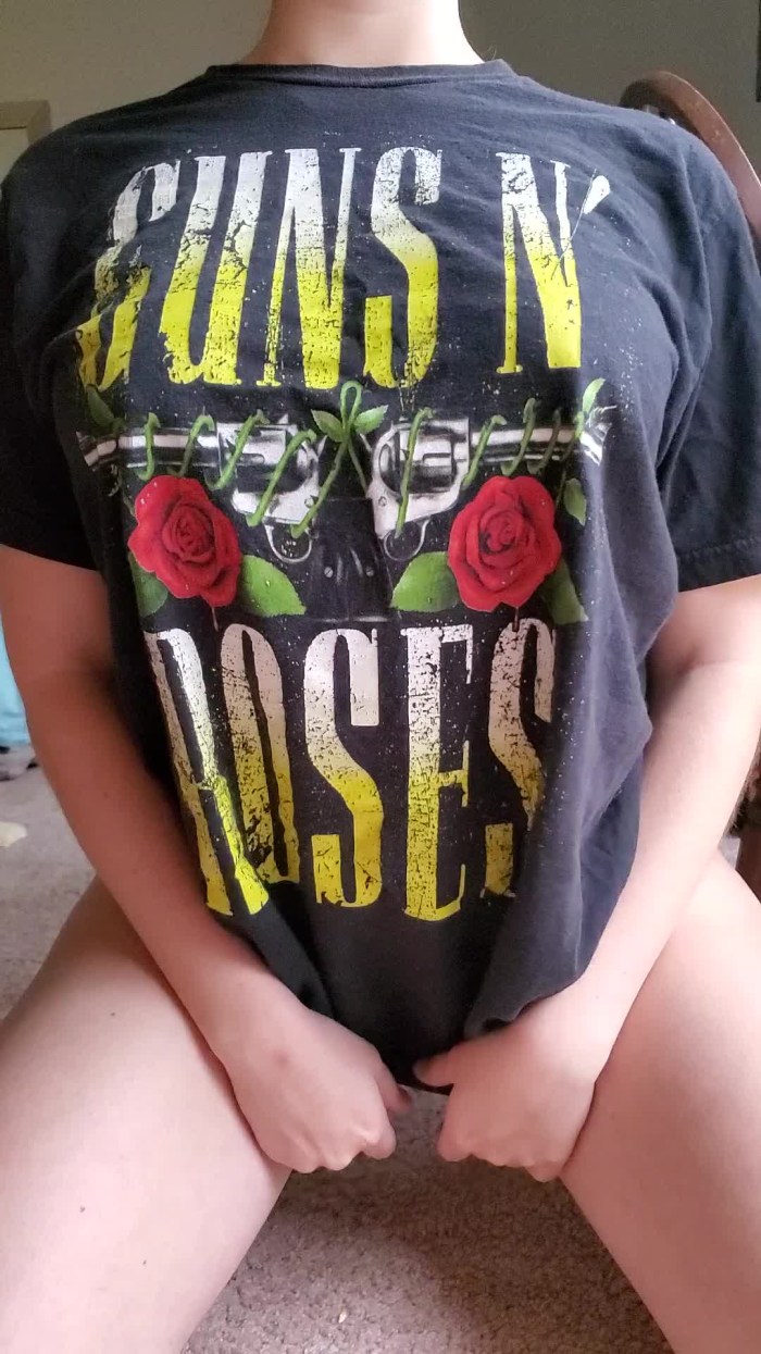 Girl in a T -shirt without panties