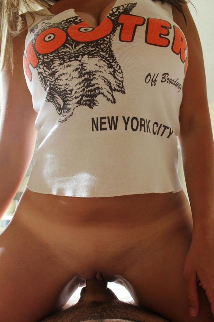 Girl in a T -shirt without panties