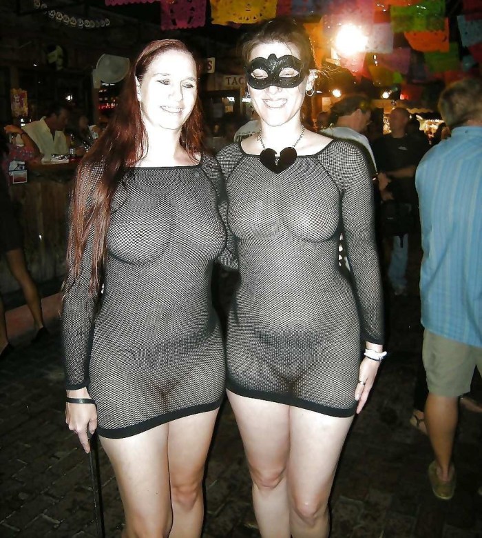 Naked women in transparent dresses