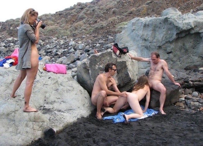 Voyeurists on a public beach