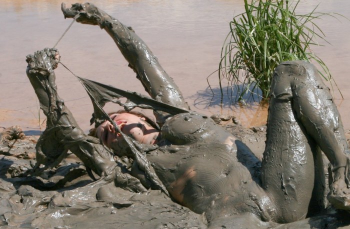 Naked dirty in a swamp