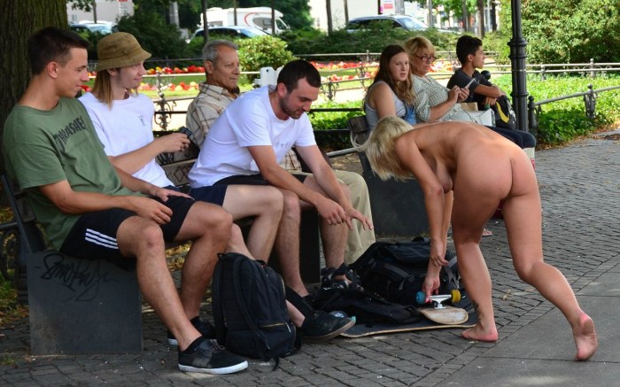 Without clothes in a public place